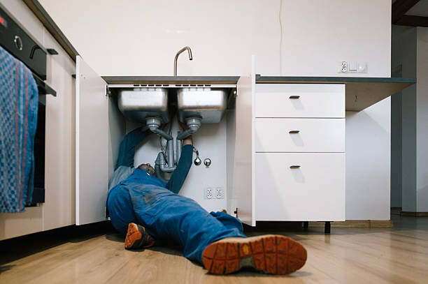 Professional Emergency Plumber technician working in Slocum, RI